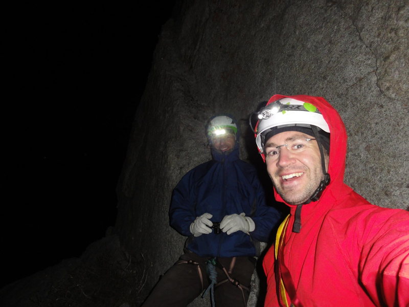 Setting up the bivouac at the top of the 4th pitch.