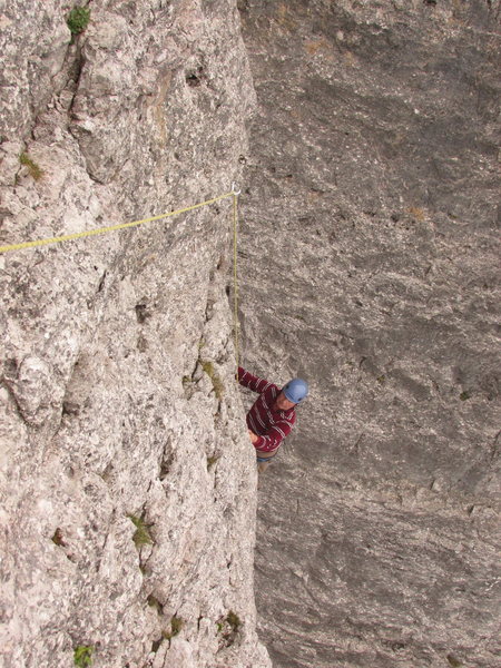 Rodger midway up lead #4, where the route approaches Torre Barancio. This section is UIAA Gr. IV-.