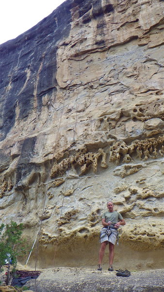 John Tully finishing a burn on Wicked.  The rope is through the top anchors.