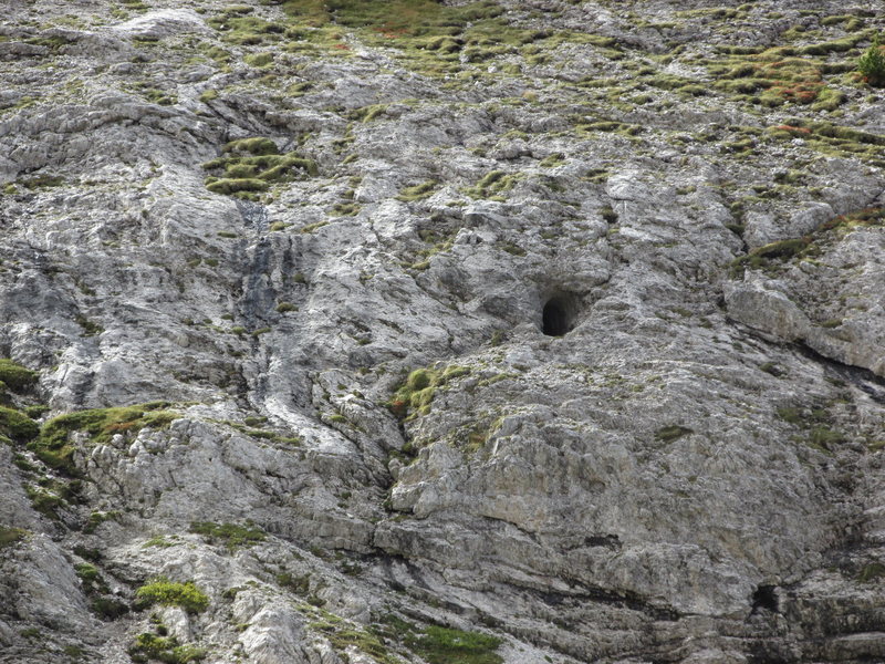 Seen from the Valparola Pass highway is the entrance to the "Golginger Stollen," or tunnel which allows scree-free access to the Colbertaldo /Arete. Flashlight or headlamps required!