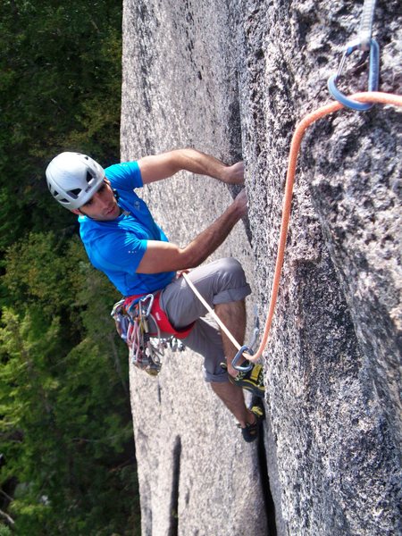 The start of the crux at the top of pitch 2.