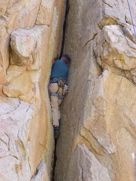 Richard, fighting to continue jamming the crack in the back of Green Goblin.