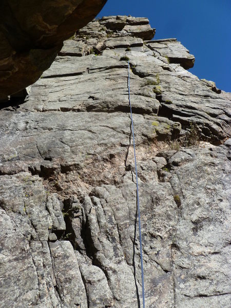 It looks like most people ascend the crack to the right of the rope.  Darren Mabe shows the climb further to the right.