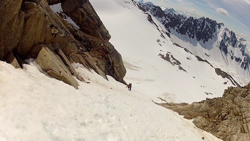 Climbing a coulior of steep snow on the First Ascent of: The Ship's Prow, near Skagway, Ak