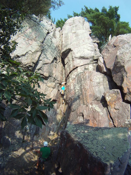 Climber is climbing Birthday Chimney