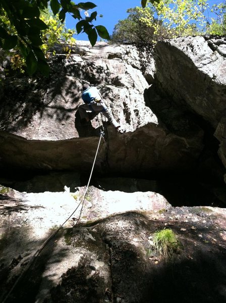 Jon pulling through on his first ascent of the .11a direct start