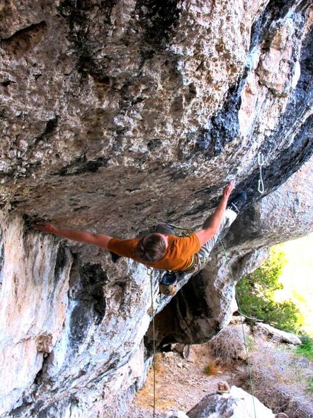 Pulling out the roof boulder problem.