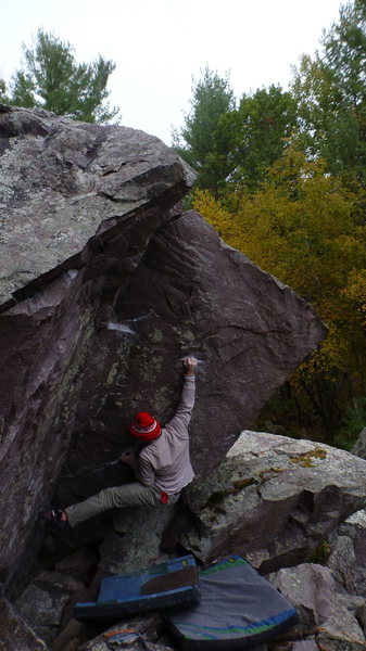 Climbing during the snow- Vince on the crimp.  