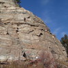 Climber on "SE Buttress Left Side" (5.5 **) on Big Butte