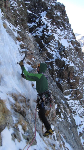 The thin smear on the traverse ledge of pitch 3.