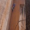 Aaron in the crux thin hands corner - the 10 foot fist roof is just above the photo<br>
The Holy Grail (5.11+)