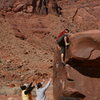 Andy topping out on the block top boulder