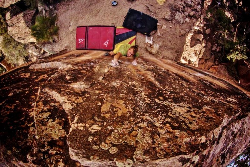 Working the two-finger gaston on a Bucket Racer Boulder problem.<br>
<br>
Photo courtesy of J. Zacher.