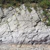 The 'Knob' - a polished north face on the downstream most 'Rocky Island' directly across the back channel which divides these islands from the Maryland side of Great Falls Park, visible distinctly from the beginning or up-stream portion of Billy Goat trail A.   Photo and captions: Dave Rockwell