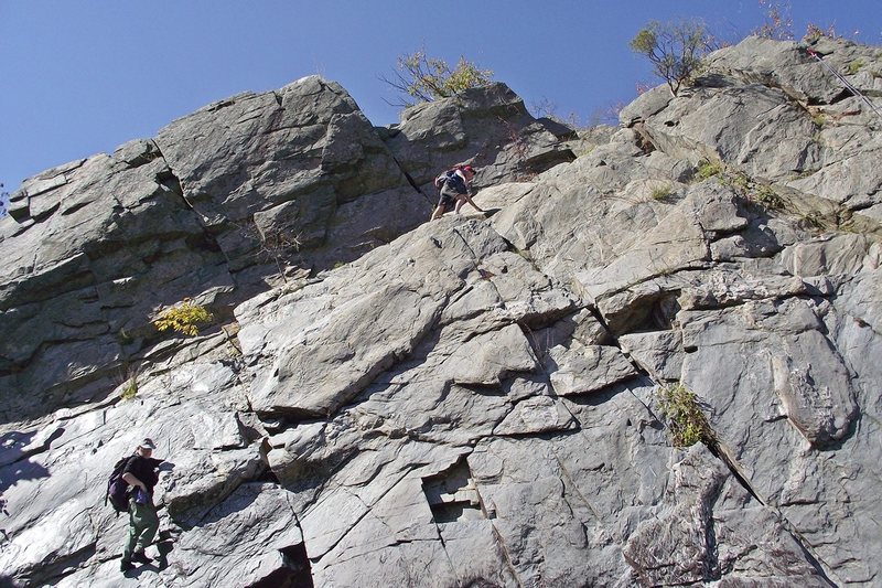 Scrambling up to the top of the Knob to set the top ropes.  Photo: Dave Rockwell