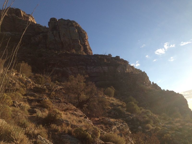 Approach to the crag, looking south. Standing close to the top of the "It Cliff." Crag is the lower section of rock, not the towering green brute above. Trail is well marked with cairns.