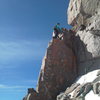 Jon Fike getting into the business, on the East side, ~50 feet below the summit.