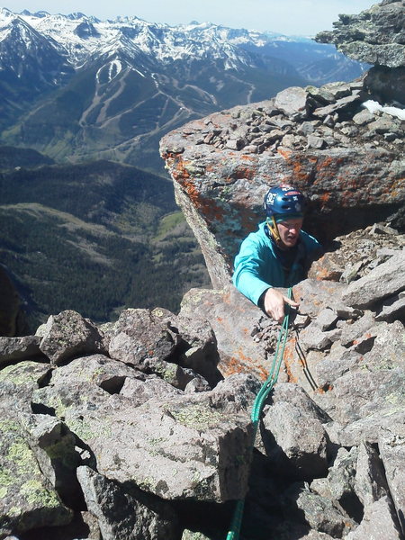  Fike topping out the final 30' chimney off the ledge on the east side of the South face of the summit block. 