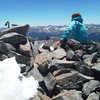 Three feet of cold steel holding the summit cairn together atop Gladstone. Lizard Head photo center.