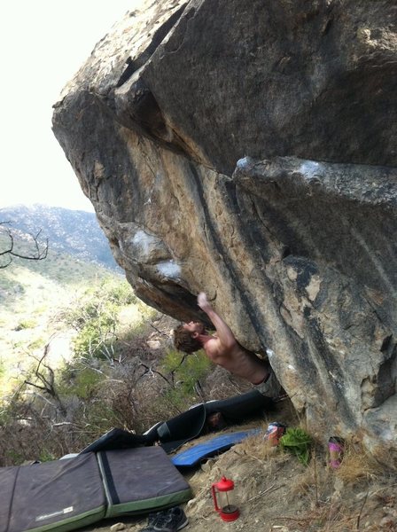 Me on the first powerful move to the pinch at the lip of the cave. 