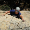 Nicole nears the top of Cupcakes & Champagne, in Rattlesnake Canyon.