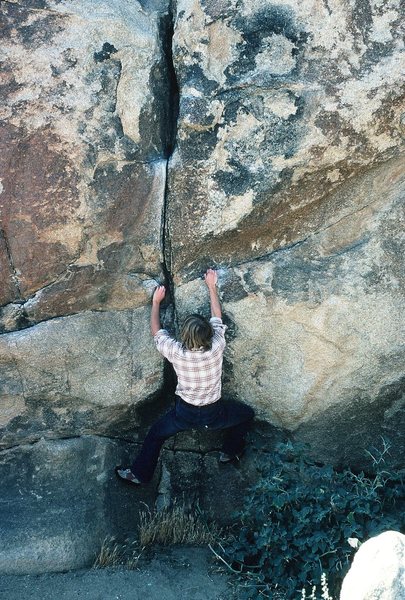 Anne Carrier, bouldering start of Wallaby Crack, 1982.