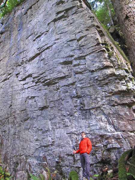 Most of the Main Wall. Above Eric, and slightly right, is an 11b. Around the right side of the arete are two 5.9s. Just left of Eric is the start of a 12a. Further left lies a 10a and a 10b. 