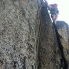 Me leading the crux pitch. 5.10c