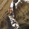 Bill Bjornstad climbing a steep 5.10+/11-