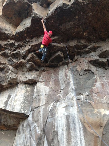 Kevin starting the upper crux of Dark Night