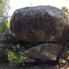 Double up boulder/ Two great fun lines go up this boulder. Right side:  Start sitting pull to the good shelf gaston the sharp crimp with the left, stand up and jump to a good pocket hidden around the lip. V4 Awesome!<br>
 Left side: same start, but this time go right hand to the crimp and swim out to a pinch/crimp with the left. stand tall and make a deadpoint or perhaps a jump to a good pocket above the lip. pull over. Also awesome! V5