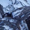 Exiting the Quartz Chimney of pitch 3. The hardest climbing is out of sight about 30 feet below.