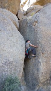 The scramble up the first pitch of south crack.  It's not a bad free solo if you are comfortable with stemming and chimney climbing.  If you're not so experienced with that style rope up and bring some larger gear for the first 30 feet.  