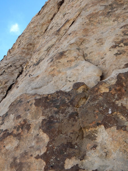 Pitch 3 goes up and left past the bolt, follows the crack for a while (solid trad placements), then eventually the next bolt appears up and left