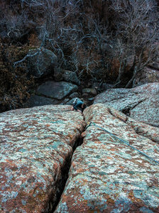 Nate climbing into the splitter tight hands corner on "Yee Haw". WWR, OK. 