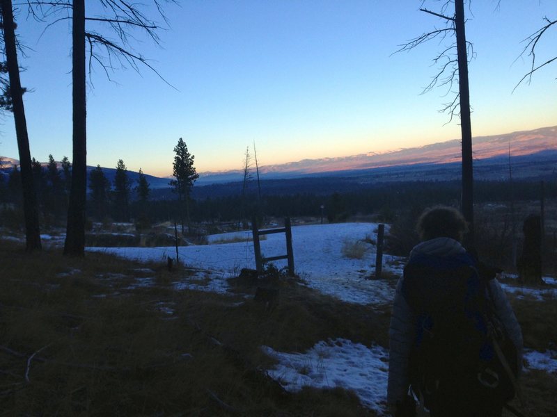 The gate where you exit the road onto the trail to the crag.