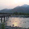 The apocalypse! The Kennicott river at flood stage during the glacial dammed Hidden Lake release and a bunch of smoke from a 70,000 acre wildfire that came to within 8 miles of town. 