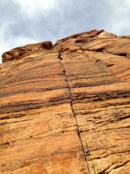 Climbing pitch one of Tricks of the Trade.