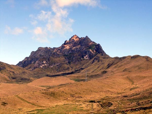 Ruco with approach along grassy ridgeline