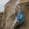 Luke Lydiard sticking the slap on The Clapper, Happy Boulders, Bishop, CA.