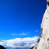 The route flips over to the other side of the arete and stays h.a.r.d. without rests for 3 more bolts or so. Thin, exfoliating slab. Well bolted, but thuggish.