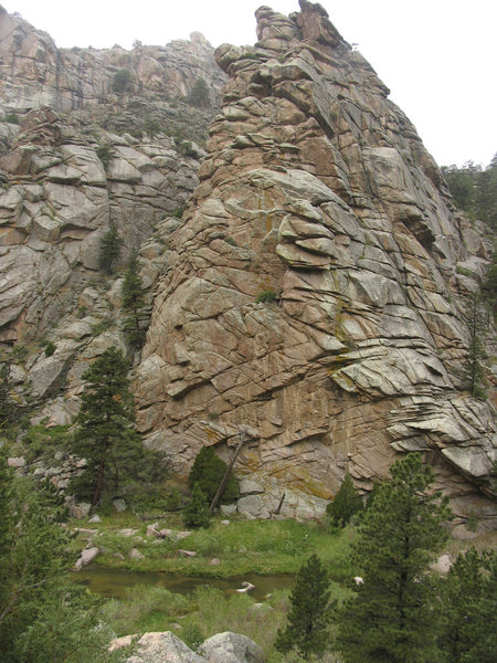 The lower end of a granite outcrop across the river from the mouth of Gneiss Canyon whose face may be the only portion of this rock buttress that is not on private land.  Any land west of the face is likely private. 
