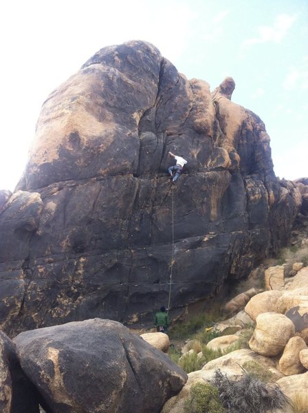 Climber on looking for jugs...