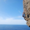 Sue climbing Suficiente at Vistamar, Tenerife.