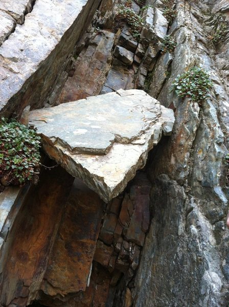 If you see this death-chock you are in the right place to pick your belay spot. For the love of god, don't weight it, lol, I think it's one dumbass move away from falling. I bet the block weighs in at 500 lbs so it's prolly a bad idea to trundle it. 