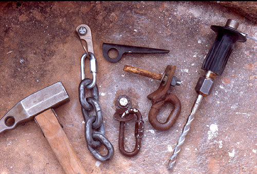 Assortment of tools and hardware.