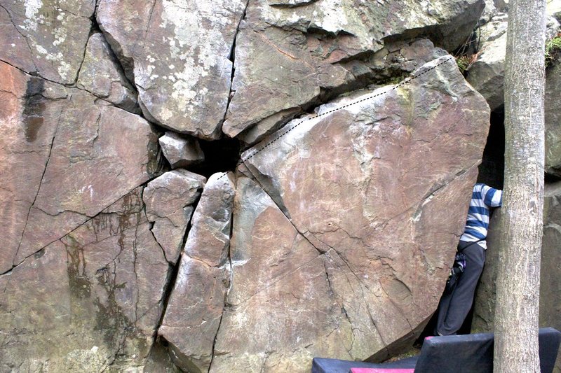 Photo of start and beginning of route. Follow through the cave and finish next to the No Hands Face boulder.