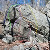 The overhanging face on the big block at the climbers left end of Balcony Rock (partially visible in the background).<br>
Y Equals X (blue)<br>
X Squared (green)<br>
X Cubed (purple)<br>
Dirt Burglar (pink)<br>
Wreck Tangle (orange) <br>
Tetris (yellow)