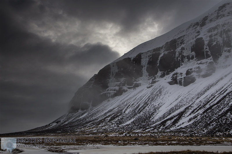 A picture taken looking south from the sea.  The entire area looks like this with random patches of ice littering the cliff sides.