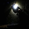 Playing on the trailside boulder on Buck Mountain at night.